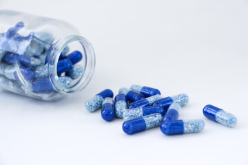 blue pills on white background