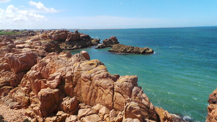 Fototapeta na wymiar Granite rose, océan - Bretagne