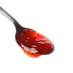Spoon with strawberry jam isolated on white background