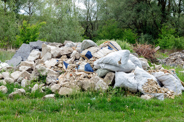 Dump of construction and household garbage in the forest.