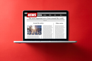 news on a computer screen. Mockup website. Newspaper and portal on internet. - 357058025