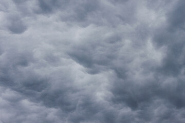 Stormy dark cloudy sky before rain texture background.