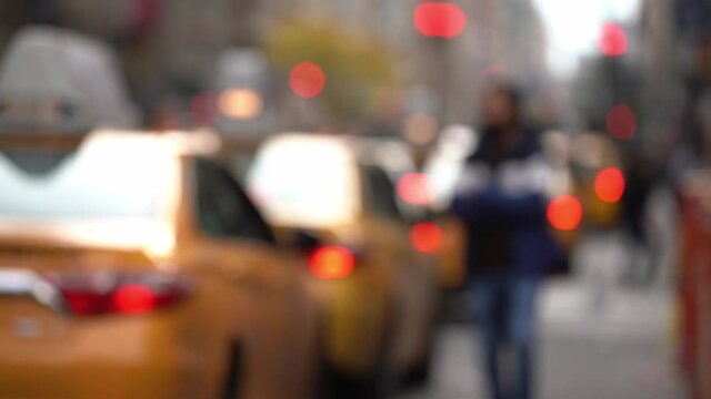 Yellow Cab Taxi in traffic, out of focus traffic jam in New York City, Manhattan