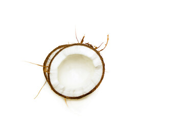 half coconut on a white background isolate, vegetarian product, raw materials for the coconut industry