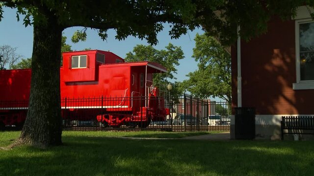 red train caboose in the park