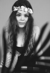 black and white photo of Close-up portrait of young woman, cute looking , smiling, lovely pretty brown-haired girl isolated over pink pastel color background