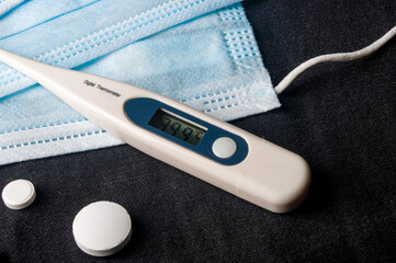 Background concept for news about the novel coronavirus COVID-19 pandemic, antiviral medical mask...