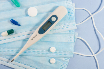 Background concept for news about the novel coronavirus COVID-19 pandemic, antiviral medical mask...