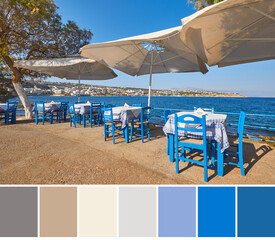 Color matching palette from image of empty Cretian restaurant with blue chairs and tables under...