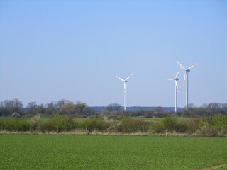 Fototapeta na wymiar wind turbine in the wind