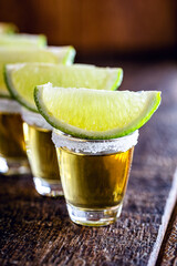 detail of the tequila drink, with a specific focus on the lemon. Typical drink from Mexico.
