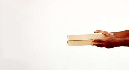 Two boxes with fast food being carried by delivery man in uniform for one of clients