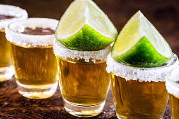 detail of the tequila drink, with a specific focus on the lemon. Typical drink from Mexico.