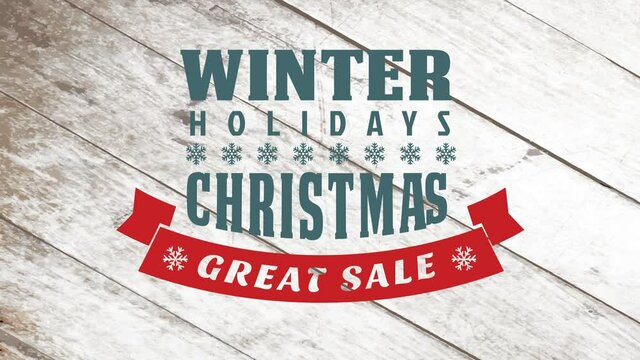 winter holidays typographic ad for great christmas sale with snowflakes decoration over old wooden background
