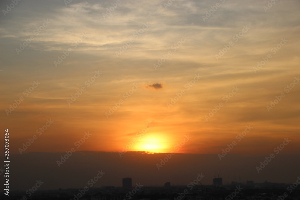 Wall mural sunset time with cloud sky