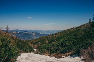 A sign on the side of a mountain
