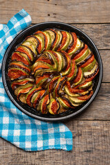 French baked ratatouille on wooden background