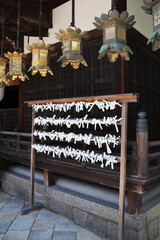 Japanese tradition of Omikuji (in an old Shinto shrine)