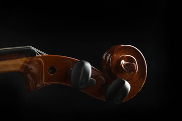 Fototapeta premium Beautiful violin on black background, closeup view