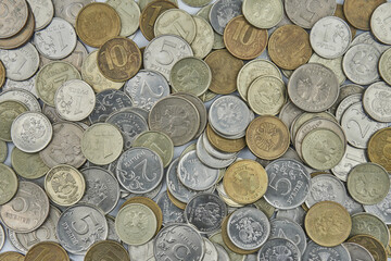 Russian coins money rubles on white background. Russian metal coins: 10, 5, 2, 1 rubles macro closeup. Money concept