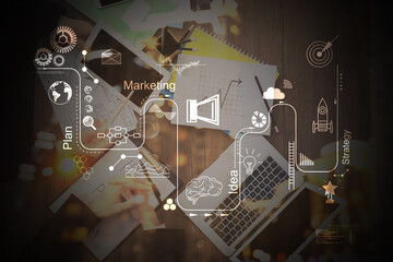 Double exposure of scheme and people working in office, top view. Digital marketing concept