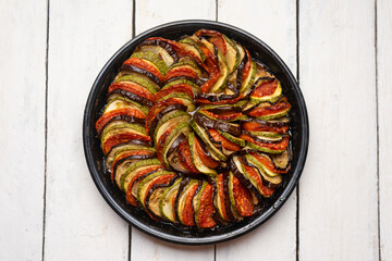 French baked ratatouille on white background