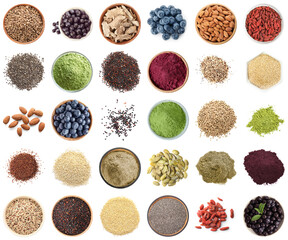 Set of different superfoods on white background, top view