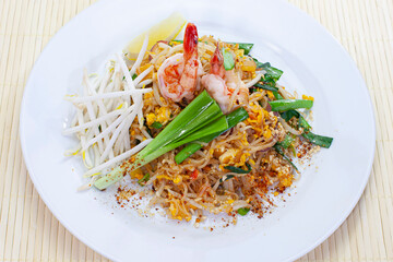 Fried noodle Thai style with prawns and vegetable