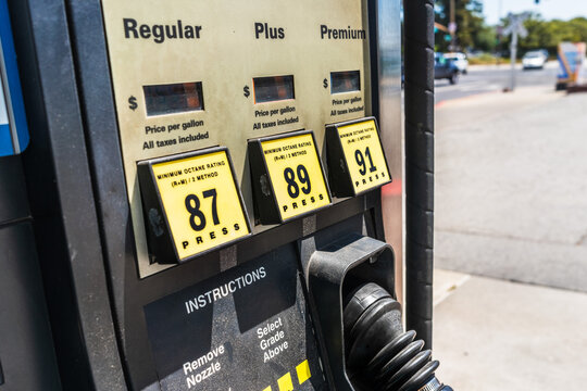 Close up of gas station pump; three octane grades available for selection; California, United States