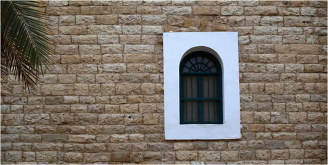 Fototapeta na wymiar window in a stone wall