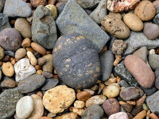 Assorted colorful coastal beach rocks and stones