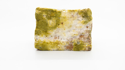 pile of sliced moldy bread, isolated on white background