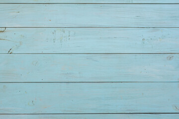 Naklejka premium Vintage wood texture painted in light blue color. Copy space
