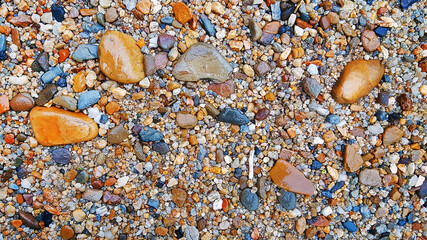 vibrant water stone on ground surface pattern for background texture