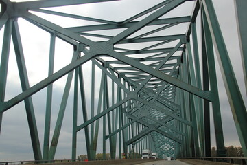 Fototapeta na wymiar Metal bridge with foggy background or maybe pollution.