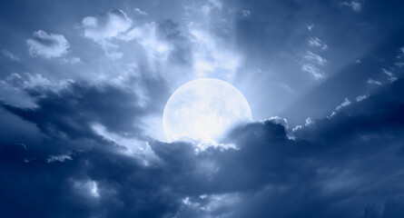 Obraz premium Night sky with moon in the clouds 