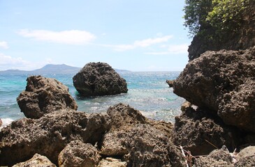 Big rough volcanic rocks in the island.