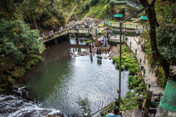 Fototapeta na wymiar Beautiful Elephant Falls, the Three steps water falls, in Shillong, Meghalaya, East Khasi Hills, India 