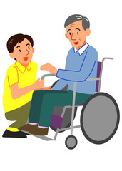 車いすの男性と介護スタッフ
