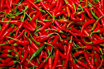 Red chilis scattered at display