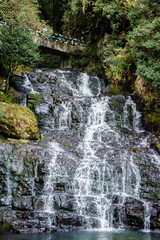 Fototapeta na wymiar Beautiful Elephant Falls, the Three steps water falls, in Shillong, Meghalaya, East Khasi Hills, India 