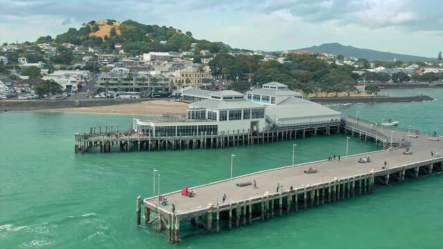 Aerial: Devonport Wharf, town center & Waitemata Harbour, Auckland, New Zealand