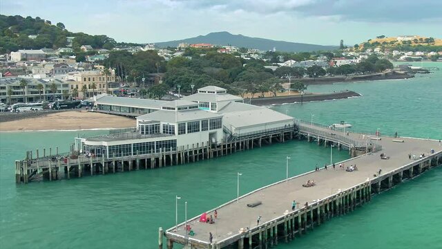 Aerial: Devonport Wharf, town center & Waitemata Harbour, Auckland, New Zealand