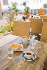 Tasty  breakfast on summer terrace on vacation.