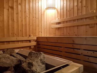 Wooden sauna room with no people.