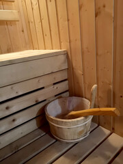Fototapeta na wymiar Wooden equipment in sauna room.