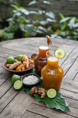 Herbal beras kencur and kunir asam are traditional Javanese heritage drinks