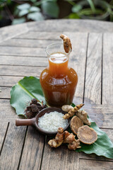 Fresh herbal drinks are packaged in glass bottles made from turmeric, ginger and tamarind