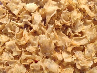 Uncooked sun dry potato chips slices top view
