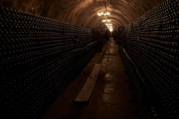 An image of an underground tunnel for aging wine.